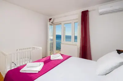 Krevet ili kreveti u jedinici u objektu Seaside Apartment Blue
