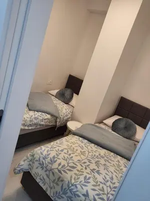 Krevet ili kreveti u jedinici u objektu Beach Spot Apartments