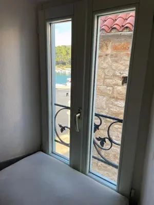 Krevet ili kreveti u jedinici u objektu KLARA Living Apartment, old town house, SEA VIEW