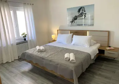 Krevet ili kreveti u jedinici u objektu Apartments with parking space Podstrana, Split - 23706