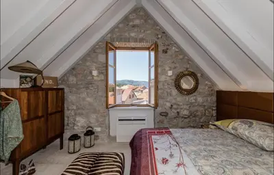Krevet ili kreveti u jedinici u objektu Townhouse Sea View Suite