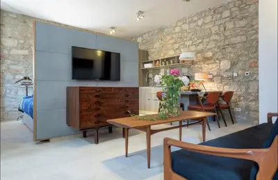 TV i/ili zabavni centar u objektu Townhouse Suite Danish Art