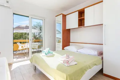 Krevet ili kreveti u jedinici u objektu Apartments by the sea Brela, Makarska - 21803
