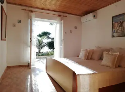 Krevet ili kreveti u jedinici u objektu Apartmani Brela 11