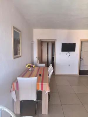 TV i/ili zabavni centar u objektu Grey One Apartments