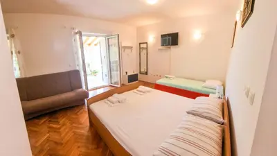 Krevet ili kreveti u jedinici u objektu Apartment Huanita