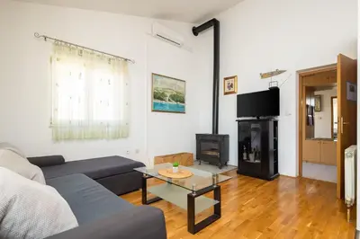TV i/ili zabavni centar u objektu Fortuna Apartments - Shared Pool