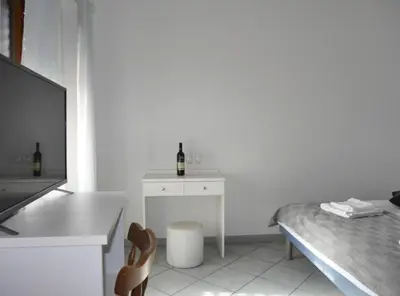 Krevet ili kreveti u jedinici u objektu Dugi Rat Seaside Apartments