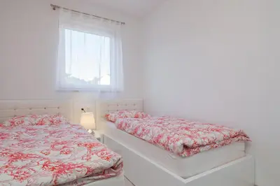 Krevet ili kreveti u jedinici u objektu La Perla apartments 3
