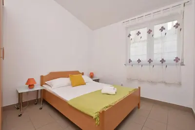 Krevet ili kreveti u jedinici u objektu Apartments Ivan
