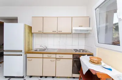 Kuhinja ili čajna kuhinja u objektu Apartments Sandra