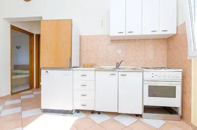 Kuhinja ili čajna kuhinja u objektu Apartments Sandra