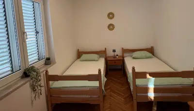 Krevet ili kreveti u jedinici u objektu Manu
