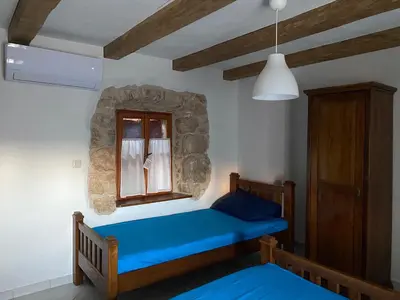 Krevet ili kreveti u jedinici u objektu Holiday Home Hauser