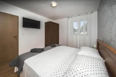 Krevet ili kreveti u jedinici u objektu Holiday Home With Seven Bedrooms and Pool