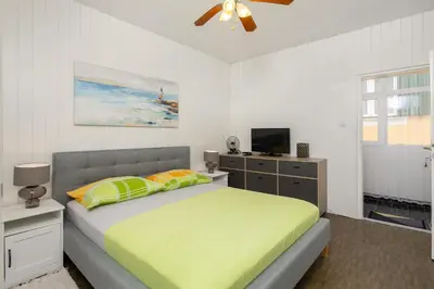 Krevet ili kreveti u jedinici u objektu Lemonade Beach Apartments