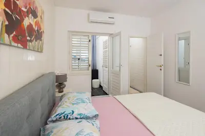 Krevet ili kreveti u jedinici u objektu Lemonade Beach Apartments