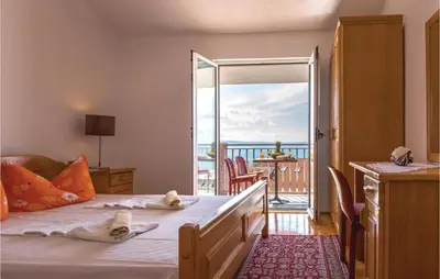 Krevet ili kreveti u jedinici u objektu Two-Bedroom Apartment Makarska With Sea View 03