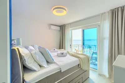 Krevet ili kreveti u jedinici u objektu Beach Apartment Stanici