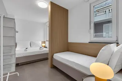Krevet ili kreveti u jedinici u objektu Perla Apartments Baska Voda