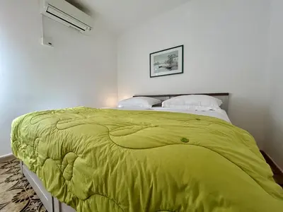 Krevet ili kreveti u jedinici u objektu Azure Apartments By The Sea Near City Omiš