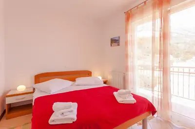 Krevet ili kreveti u jedinici u objektu Apartmani Brela 14