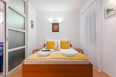 Krevet ili kreveti u jedinici u objektu Sunset Apartments Mate
