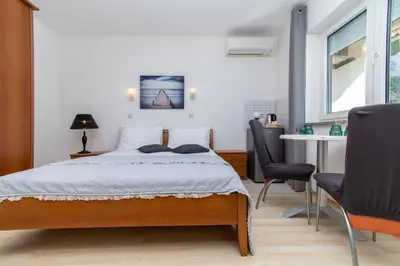Krevet ili kreveti u jedinici u objektu Apartment and Rooms Ana