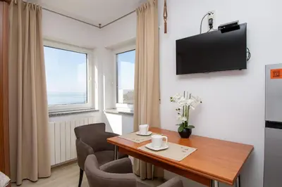 TV i/ili zabavni centar u objektu Apartment and Rooms Ana