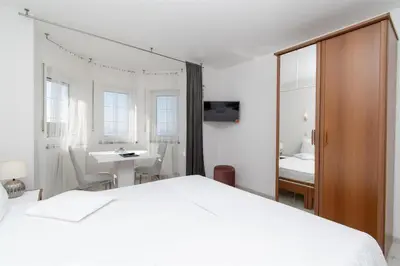 Krevet ili kreveti u jedinici u objektu Apartment and Rooms Ana