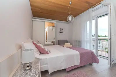 Krevet ili kreveti u jedinici u objektu Apartment Vera i Ćiro Novak, sea view and free parking