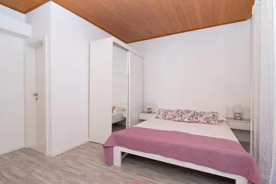Krevet ili kreveti u jedinici u objektu Apartment Vera i Ćiro Novak, sea view and free parking