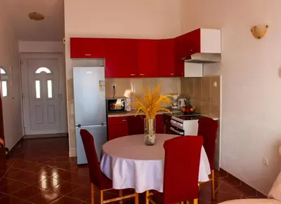 Kuhinja ili čajna kuhinja u objektu Apartments by the sea Pisak - Omis - 23886