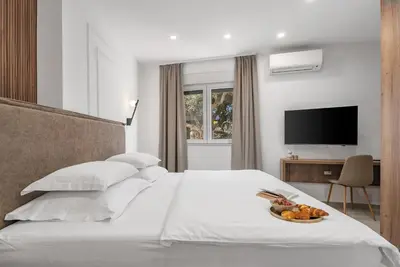 Krevet ili kreveti u jedinici u objektu Luxury Tommy's Apartment