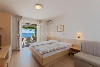 Krevet ili kreveti u jedinici u objektu Beachfront Brela Apartments Ljubica