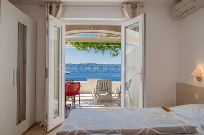 Krevet ili kreveti u jedinici u objektu Beachfront Brela Apartments Ljubica
