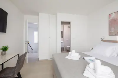 Krevet ili kreveti u jedinici u objektu Villa Maris & Ivana Brela 2x28m2 heated pool gym