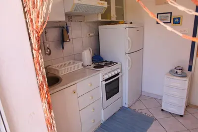 Kuhinja ili čajna kuhinja u objektu Holiday House Doda
