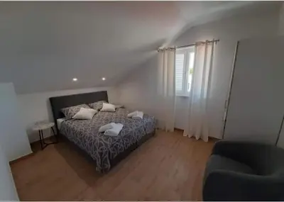 Krevet ili kreveti u jedinici u objektu Apartments Dobrila