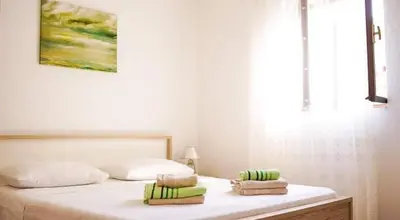 Krevet ili kreveti u jedinici u objektu Apartments by the sea Sutivan, Brac - 23920