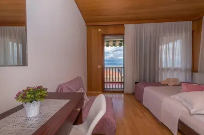 Krevet ili kreveti u jedinici u objektu Vera i Ćiro Novak 2, sea view and free parking