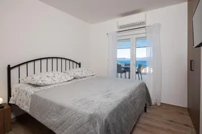 Krevet ili kreveti u jedinici u objektu Hedonist Apartment