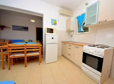 Kuhinja ili čajna kuhinja u objektu Coastal Breeze House