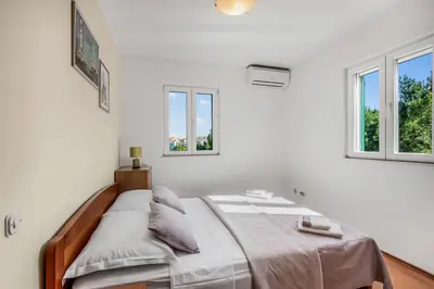 Krevet ili kreveti u jedinici u objektu Spacious & Charming Apartment 128 m2 with Sea View