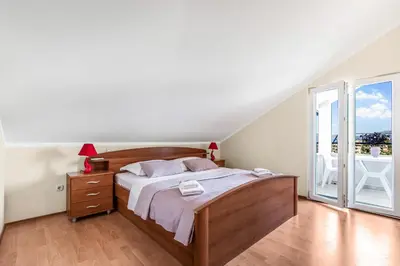 Krevet ili kreveti u jedinici u objektu Spacious & Charming Apartment 128 m2 with Sea View