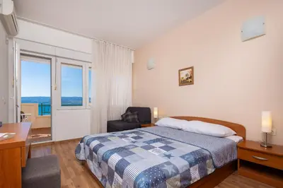 Krevet ili kreveti u jedinici u objektu Diamond Beachfront Apartments