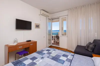 Krevet ili kreveti u jedinici u objektu Diamond Beachfront Apartments
