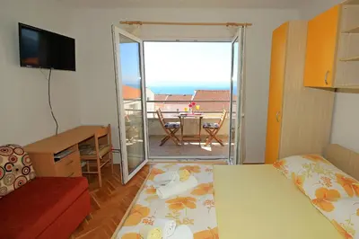 Krevet ili kreveti u jedinici u objektu Apartments Adriatika