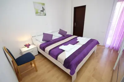 Krevet ili kreveti u jedinici u objektu Apartments with parking space Makarska - 24071