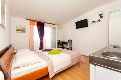 Krevet ili kreveti u jedinici u objektu Apartments Luka